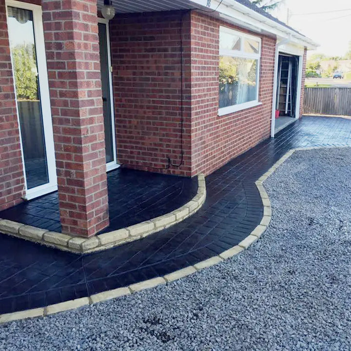 Swiss Seal London Cobble Charcoal Driveway & Patio Sealer: charcoal container with applicator roller on a plain background.